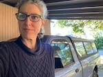 Bonnie Dixon, pictured with her 1997 Ford Ranger, drives only about once a week. When she does, she would prefer to be driving a zero-emission vehicle. But she can't find a new one in her budget.
