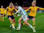 Sweden's Linda Sembrant, left, and Sofia Jakobsson challenge Argentina's Paulina Gramaglia for the ball on Wednesday in Hamilton, New Zealand. Sweden won its group and will face the U.S. in its next match.