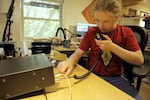 Zeke Wheeler on his ham radio in his basement in SW Portland. Sept. 30, 2024