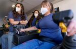 Women at Coffee Creek Correctional Facility, (left to right) Heidi Urban, Gracilia Sanchez, and Kristina Tillo train on a heavy operator simulator. Twelve women at Coffee Creek are among the first to benefit from the grant-funded program, through a five-week training. More than 100 applied.