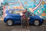 A Portland family tests out a new pilot electric car sharing program in the Cully neighborhood.