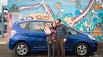 A Portland family tests out a new pilot electric car sharing program in the Cully neighborhood.