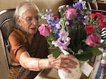 Subhan Ali's mother, Syeda Ali, receiving flowers on her birthday in 2017.