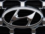 Hyundai and Kia are telling owners of over 571,000 SUVs and minivans in the U.S. to park them outdoors because the tow hitch harnesses can catch fire while they are parked or being driven. The Korean automakers are recalling the vehicles.