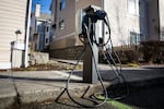 FILE - Electric car charging stations are seen at the Residence Inn by Marriott in Northeast Portland on Thursday, Feb. 28, 2019.