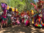 Members of "Risk of Change" in costume for a parade through the fairgrounds in July 2024.