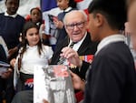 D-Day veteran and Ambassador for the British Normandy Memorial Ken Hay, 98, who served with the 4th Dorset Regiment, speaks to children during a visit to Rush Green Primary School in Dagenham, England, on Monday, May 20, 2024, ahead of the 80th anniversary of the D-Day landings.