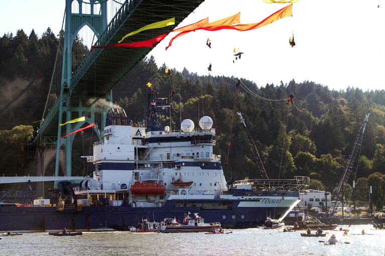 The U.S. Coast Guard escorted the ice breaker Fennica past protesters, July 30, 2015.