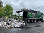 A Waste Management garbage truck load fire during curbside pickup in Beaverton in 2021. Waste Management spokesperson Jackie Lang said batteries, barbeque coals not properly put out or fireworks are likely culprits for truck fires. But most battery caused fires have gone up 40% over the last five years. 
“Batteries are everywhere today,” Waste Management spokesperson Jackie Lang said. “That creates a safety challenge that we haven't necessarily experienced before.”