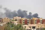 Smoke rises after the first strikes of the war on April 17, 2023.