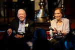 FILE - Former President Jimmy Carter, left, and his wife, former first lady Rosalynn Carter, sit together during a reception to celebrate their 75th anniversary, July 10, 2021, in Plains, Ga.