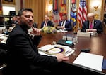 Ukraine's President Volodymyr Zelenskyy, left, sits before a meeting with President Donald Trump, from right, Vice President JD Vance and Treasury Secretary Scott Bessent in the Cabinet Room of the White House, Friday, Oct. 17, 2025, in Washington.