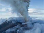 This photo taken from video by Artem Sheldr shows an aerial view of the eruption of the Krasheninnikov volcano of the Eastern volcanic belt, about 200 km (125 miles) northeast of the regional center of Petropavlovsk-Kamchatsky, Russia far east, Sunday, Aug. 3, 2025.