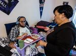 Smith brings food to Goods. She noticed right away when, two years ago, Social Security sent her son an extra SSI check. Right away, she went to the Social Security office, returned the money and got receipts. But now the agency says she still owes the money.