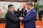 FILE - In this photo provided by the North Korean government, North Korean leader Kim Jong Un, left, shakes hands with Chinese President Xi Jinping in Beijing Thursday, Sept. 4, 2025. Independent journalists were not given access to cover the event depicted in this image distributed by the North Korean government. The content of this image is as provided and cannot be independently verified. Korean language watermark on image as provided by source reads: "KCNA" which is the abbreviation for Korean Central News Agency. (Korean Central News Agency/Korea News Service via AP, File)