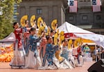 Dancers perform traditional fan dancing while on stage at the Oregon Chinese Coalition’s Chinese Festival in Pioneer Courthouse Square in Portland, Ore., on Aug 1, 2026.
