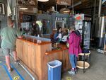 Customers flocked to the River Mile 38 brewpub in Cathlamet after it reopened its tasting room and patio in mid-May. Wahkiakum County is in the vanguard of Washington counties advancing through Safe Start reopening phases.