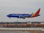 Southwest Airlines says more than 16,700 of its flights were cancelled between Dec. 21-31, which will cost the company as much as $825 million.