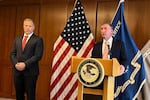 (From left) First Assistant U.S. Attorney Pete Serrano, Eastern District of Washington, and acting U.S. Attorney Neil Floyd, Western District of Washington, hold a press conference Monday afternoon, Oct. 26, 2026. They alleged they have found 405 non-citizens who are registered to vote in Washington state, and who have also voted in the state.