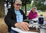 Retired electrician David Snyder transmits Morse code during the National Association for Amateur Radio field day in Vancouver, Wash., June 27, 2026.