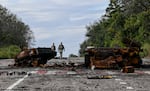 Destroyed armored vehicles litter the road in Balakliya, Kharkiv region, on Saturday.