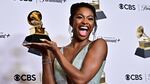 Coco Jones poses in the press room with the Grammy for best R&B performance for "ICU" during the 66th annual Grammy Awards.