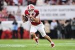 Indiana quarterback Fernando Mendoza (15) rolls out during the second half of the Rose Bowl College Football Playoff quarterfinal game against Alabama Thursday, Jan. 1, 2026, in Pasadena, Calif.