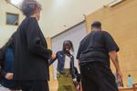 Portland City Council candidate Jo Ann Hardesty leads the crowd in a group dance at a candidates debate for the arts on Oct. 1, 2018.