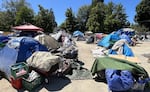A public resting site in downtown Grants Pass, Ore., July 1, 2026. The city has closed two others as it makes shelter beds available.