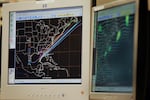 Computer monitors at NOAA's National Hurricane Center in Miami show the track forecasts for Tropical Storm Alberto in 2006.