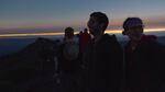 Dusk falls and orange light glows on the horizon during totality.