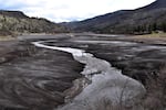 The Klamath River carving through the bed of the former Copco Lake reservoir.