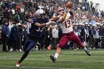 Central Catholic's  Kimo Hiu (13) narrowly misses the interception. The pass was eventually caught by Lake Oswego's Malcolm Williams (33). The Central Catholic Rams played the Lake Oswego Lakers at Hillsboro Stadium in Hillsboro, Oregon, on Dec. 7, 2019. The Rams defeated the Lakers 49-28.