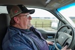 Farmer Dick Zimmerlee drives around the valley in Crook County, Oregon where he grew up. He decided to retire there and share ground with a Knife River sand and gravel mine, but now he's staunchly opposed to the company, and believes its processes tainted the groundwater. April 6, 2023.