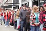 Portland Thorns fans line up outside Grand Central Bowl in Portland, Ore. on Nov. 15, 2025 to watch their team in the NWSL semi-finals.