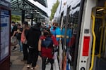 Rose City Comic Con attendees and others exit the MAX Light Rail during the first full day of Interstate 5 southbound closures through the Rose Quarter for five weeks in Portland, Ore., on Sept. 12, 2026. Some riders said they opted to take the MAX to get to the comic convention rather than drive during the I-5 closure.