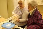Shelter volunteers prepare dinner at the Episcopal church in Sisters, Ore., on Feb. 21, 2019.