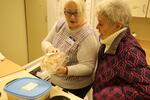 Shelter volunteers prepare dinner at the Episcopal church in Sisters, Ore., on Feb. 21, 2019. 