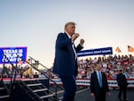 Former President Donald Trump dances after speaking at a rally at the Waco Regional Airport last March in Waco, Texas.