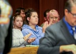 Kayla Medina, center, claps during a drug court session on Oct. 3, 2023. Medina is among those opposing plans to end Cowlitz County's mental health sales tax.