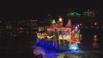 Here comes Santa Claus. Here comes Santa Claus. Right down the Willamette River way.