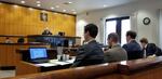 Russell Courtier, second from left facing judge, sits in court during closing remarks at the Multnomah County Courthouse in Portland, Ore., on March 15, 2019.