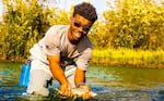 Tara Cooper's son Andre Tharp fly fishing in the Arctic Circle in the Venati Village and immersion with the Gwich’in Nation as part of Soul River's deployment in the summer of 2018.