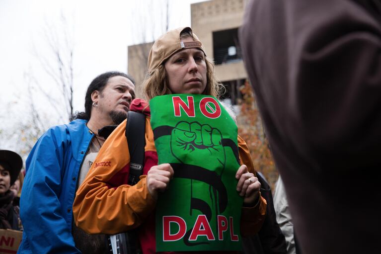 Several hundred people joined the protest Monday outside an Army Corps of Engineers building in downtown Portland