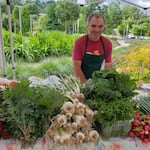 A vendor at the South Waterfront Farmers Market in Portland