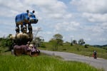 A stack of three hippo statues stands at Hacienda Nápoles Park, once the private estate of drug kingpin Pablo Escobar, in Puerto Triunfo, Colombia.