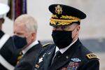 Joint Chiefs Chairman Gen. Mark Milley attends a Veterans Day wreath laying ceremony led by President Donald Trump at the Tomb of the Unknown Soldier at Arlington National Cemetery in Arlington, Va., Wednesday, Nov. 11, 2020.