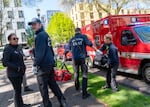 FILE - A team from the Community Health Assess and Treat (CHAT) responds to a call in Portland, Ore., April 17, 2024. The unit is part of Portland Fire & Rescue’s community outreach program, responding to low-acuity medical calls and overdoses.