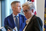 Portland Mayor Ted Wheeler, left, looks out a window as Gov. Tina Kotek speaks at a press conference in Portland, Jan. 30, 2024, where a a 90-day state of emergency was declared to address the fentanyl crisis in Portland. The action followed a recommendation by the Portland Central City Task Force, and will direct resources in an “unified response.”