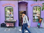 Pedestrians walk past the Fabulosa Books store in San Francisco's Castro District on Thursday, June 27, 2024.